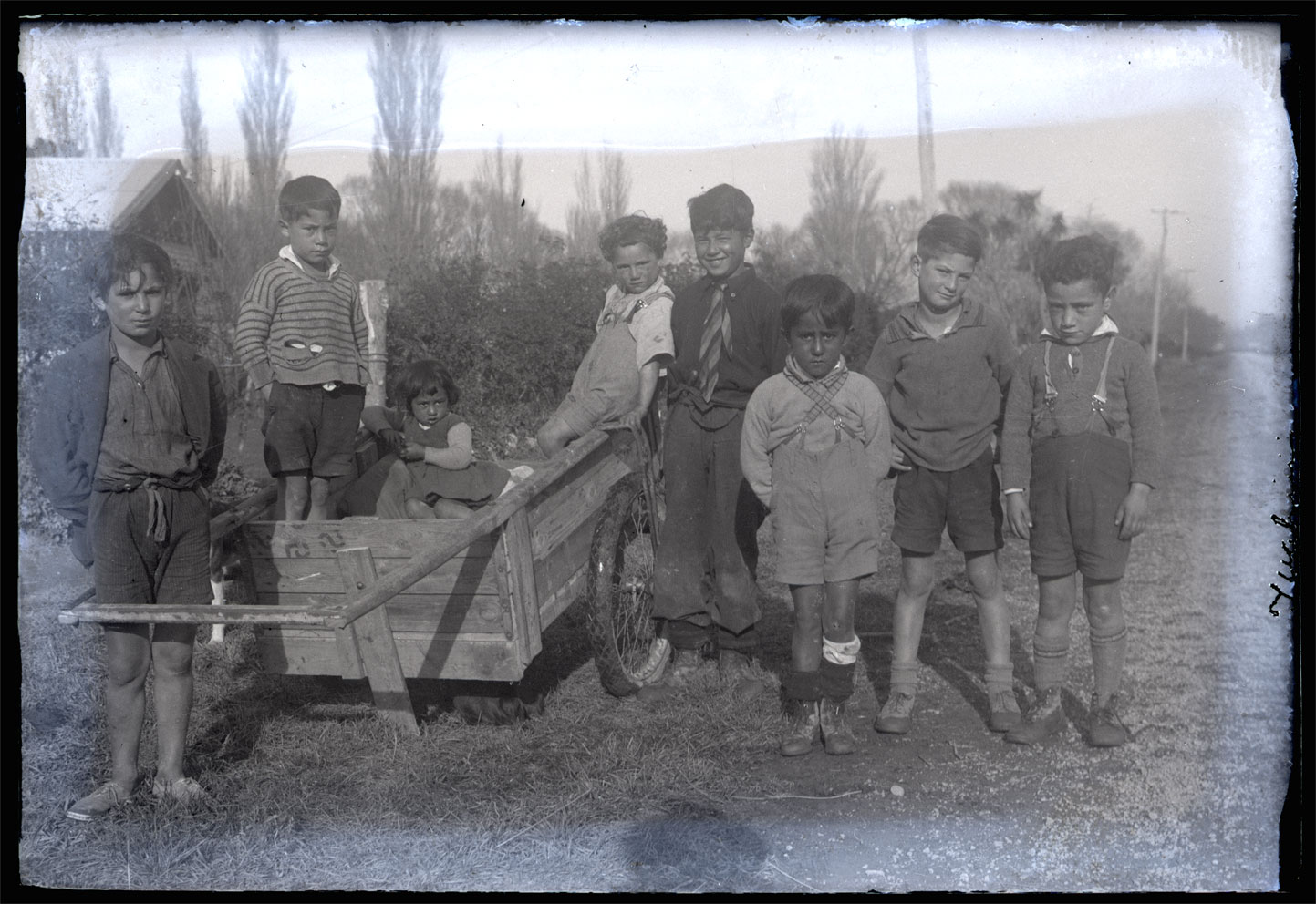 <p>Tamariki at Tuahiwi, c.1936. Left to right: Joe Howse, Mutu Hopkinson, Iola Croft, Trevor Howse, Charles Barrett, Dominic Croft, Gerald Howse and Jono Croft. W.A. Taylor Collection, Canterbury Museum, 1968.213.3207</p>