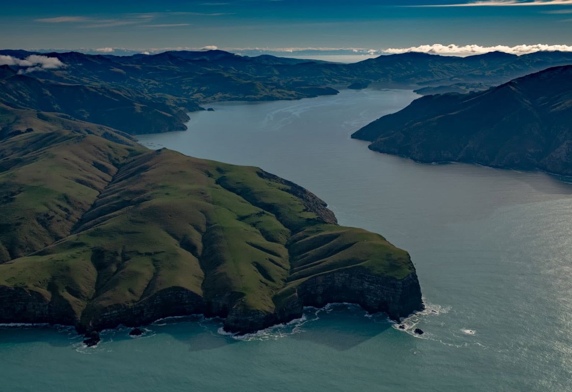 <p>Timutimu Head is the western headland of the entrance into Akaroa Harbour.&nbsp;Te Rūnanga o Ngāi Tahu Collection, Ngāi Tahu Archive, 2018-0311</p>